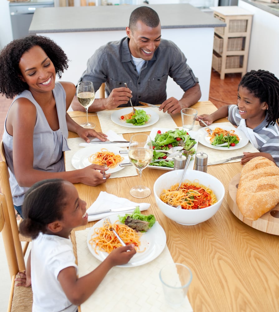 A happy family enjoying a healthy dinner